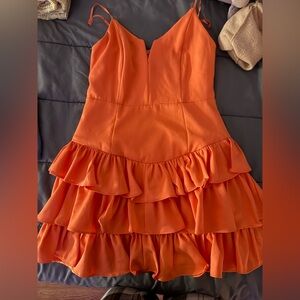 NEVER WORN!!
cute boutique dress! great for homecoming or game days!